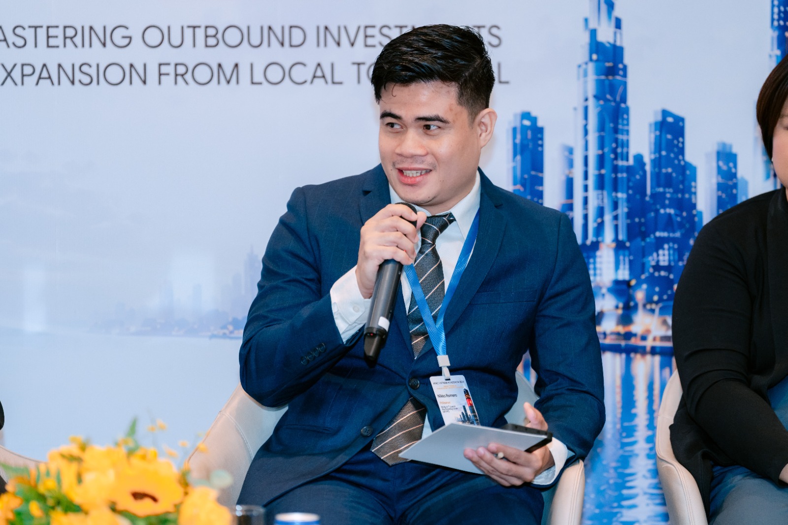 Nikko B. Romero speaking at the APAC Vietnam Roadshow